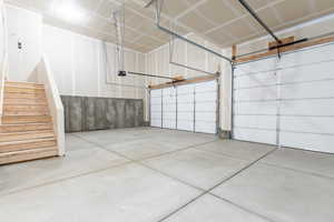 Garage featuring a garage door opener