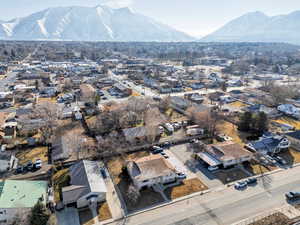 Drone / aerial view featuring a residential view and a mountain view