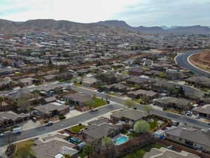 Drone / aerial view featuring a residential view and a mountain view