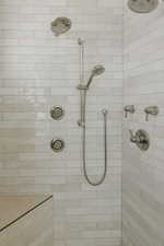 Bathroom with a tile shower