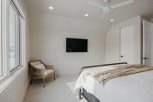 Bedroom with light carpet, baseboards, a ceiling fan, and recessed lighting