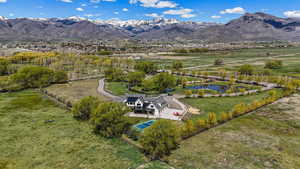 Aerial view featuring a water and mountain view