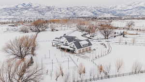 Snowy aerial view with a mountain view