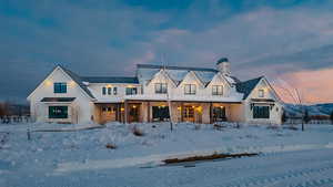 Modern farmhouse featuring a chimney