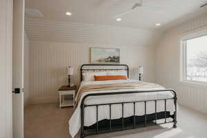 Bedroom featuring carpet, visible vents, and recessed lighting