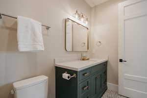 Bathroom with toilet and vanity