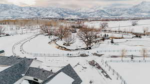 Snowy aerial view with a mountain view