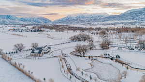 Snowy aerial view with a mountain view