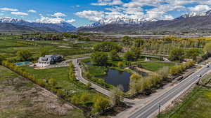 Bird's eye view featuring a water and mountain view