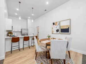 Dining room opens to the kitchen.