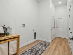 Laundry room with additional storage and access to the garage and common breezeway.