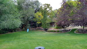 View of yard with a playground