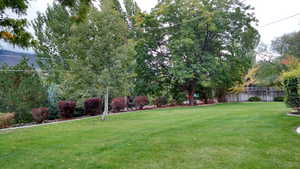 View of yard with fence