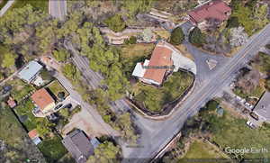 Birds eye view of property with a residential view