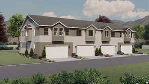 View of property with a garage, central AC, and a front lawn