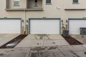 Garage with central AC and driveway