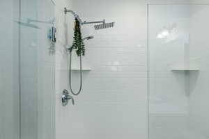Full bath with a shower stall