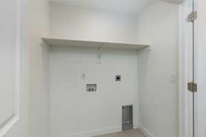 Laundry room with washer hookup, light wood finished floors, hookup for an electric dryer, laundry area, and baseboards