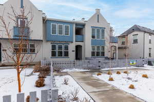 View of front of house with a fenced front yard