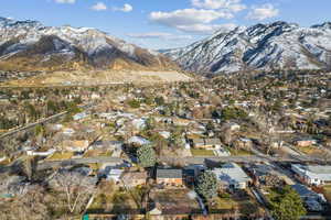 Property view of mountains featuring a residential view