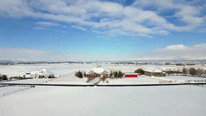 View of yard layered in snow