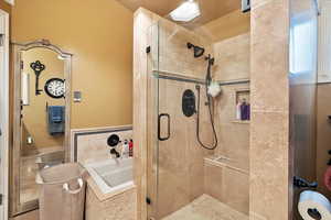 Master bathroom with plus walk in shower