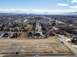 Birds eye view of property featuring a residential view and a mountain view