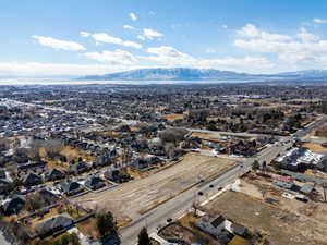 Drone / aerial view featuring a residential view and a mountain view