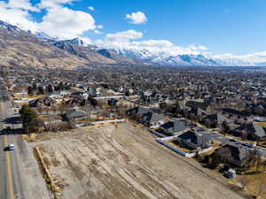 Drone / aerial view featuring a residential view and a mountain view