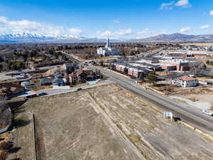 Drone / aerial view featuring a residential view and a mountain view