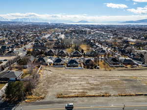 Drone / aerial view with a residential view and a mountain view