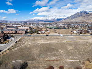 Aerial view featuring a residential view and a mountain view