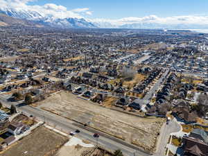 Drone / aerial view with a residential view and a mountain view