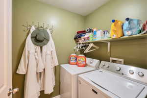 Washroom with laundry area and independent washer and dryer