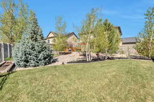 View of yard with fence