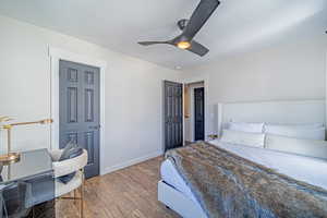 Corner Bedroom featuring Tile Floors.