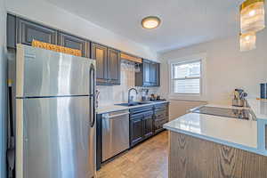 Updated Kitchen with Quartz Countertops.