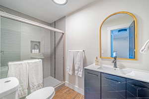 3/4 Bathroom with Updated Vanity, Tile Floors and Large Shower.