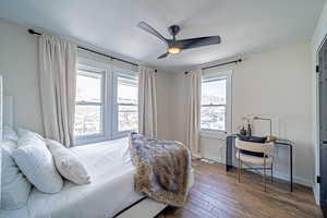 Corner Bedroom featuring Tile Floors.