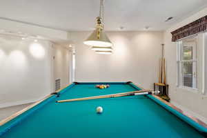 Rec room featuring pool table, visible vents, and baseboards