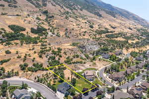 Drone / aerial view featuring a residential view and a mountain view