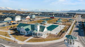 Birds eye view of property with a residential view and a mountain view