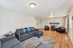 Living room with wood finished floors and baseboards
