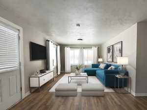 Living area with dark wood-style flooring, a textured ceiling, and baseboards