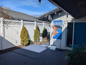 View of patio / terrace featuring fence