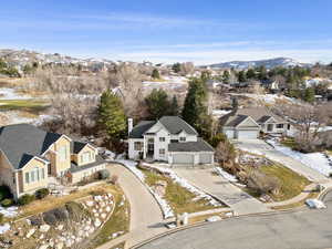 Drone / aerial view with a mountain view and a residential view