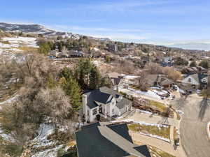 Drone / aerial view featuring a residential view and a mountain view