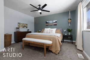 Carpeted bedroom with baseboards, visible vents, and ceiling fan