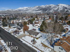 Property view of mountains with a residential view