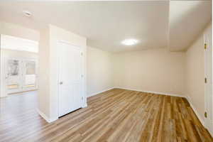 Livingroom room with new window, paint  new  light LVP flooring.